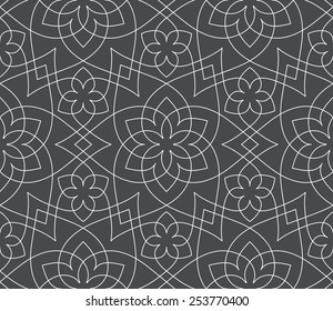 Seamless pattern. Ornament of lines and curls. Linear abstract background.