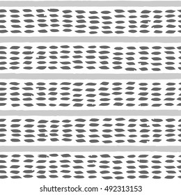 Seamless pattern. Ornament with paint stripe and brush strokes. Handmade stylized texture
