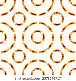 Seamless pattern with ornamental circles shapes. Ethnic motifs pattern. Yellow and brown colors. Vector color background. Textile print template. Vector pattern for fashion prints and backgrounds.