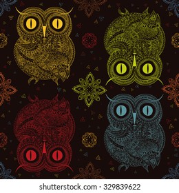 Seamless pattern from ornamental color owl with flowers and mandala. African, indian, totem, tattoo. It may be used for design of a t-shirt, bag, postcard, a poster and so on.
