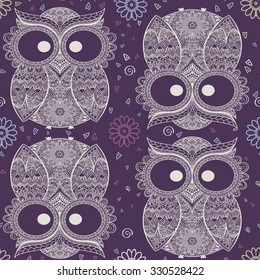 Seamless pattern from ornamental color owl with flowers and mandala. African, indian, totem, tattoo. It may be used for design of a t-shirt, bag, postcard, a poster and so on.