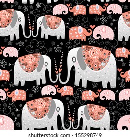 seamless pattern of ornamental elephants on a black background 