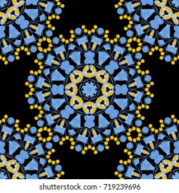 Seamless pattern with ornamental mandalas. Black, blue and yellow filigree ornament. Vector colorful template for wallpaper, textile, shawl, carpet and any surface.