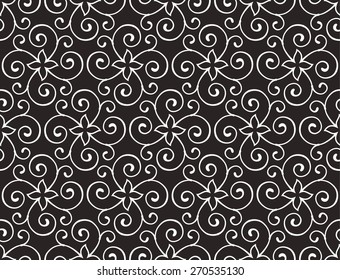 Seamless pattern. Ornamental pattern of the stylish lines and curls.