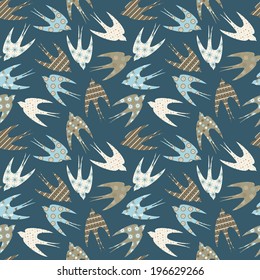 Seamless pattern with ornamental swallows. Vector decorative background with birds in vintage colors
