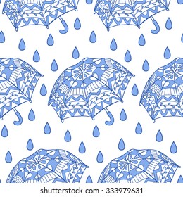 Seamless pattern with ornamental umbrellas and rain. Vector illustration of doodle umbrella seamless pattern for backgrounds, wallpapers, wrapping, textile prints