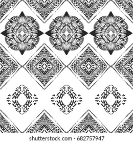 Seamless pattern with ornaments in bohemian style. Native American vector elements painted with grunge brushes