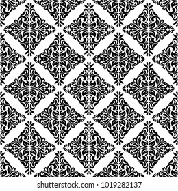 Seamless pattern with ornate Damask ornament on a white background. Design of curls and plant elements Ideal for textile print and wallpapers.