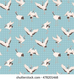 Seamless pattern with ornate dancing japanese cranes. Vector background with traditional asian motives.