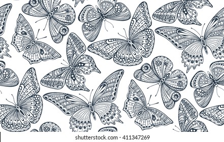 Seamless pattern with  ornate doodle hand drawn butterflies. Beautiful vector background.