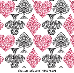 Seamless pattern with ornate doodle hand drawn playing card suits. Beautiful black and white vector background