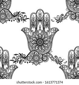 Seamless pattern with ornate hand drawn hamsa. Popular Arabic and Jewish amulet. Vector illustration. Outline vector illustration, isolated on white background.