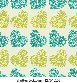 Seamless pattern with ornate hearts