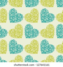 Seamless pattern with ornate hearts
