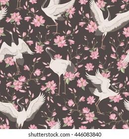 Seamless pattern with ornate magnolia flowers and japanese cranes. Vector floral background with traditional motives.