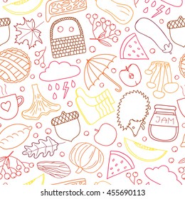 Seamless pattern with outline autumn items in warm colors.