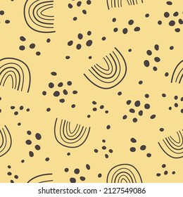 Seamless pattern with outline rainbow on the yellow background. Abstract digital background with vector hand drawn elements. Seamless pattern for kids fabric, textile.
