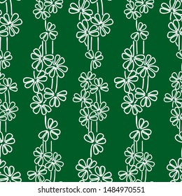 Seamless pattern of outlines stylized daisies