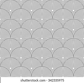 Seamless pattern with overlapping circles. Vector art.