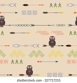 Seamless pattern with owls, arrows and tribal elements