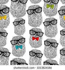 Seamless pattern of owls in hipster style isolated on white background. Endless wallpaper in vector.