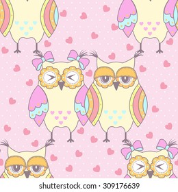 Seamless pattern with owls in love on a pink background