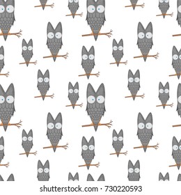 Seamless pattern of owls on a branch for kids stationery designs and clothing. cartoon bird. Obverse the paper. Background for notebook. isolated on a white background