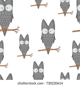 Seamless pattern of owls on a branch for kids stationery designs and clothing. cartoon bird. Obverse the paper. Background for notebook. isolated on a white background
