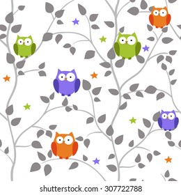 Seamless pattern with owls on branches