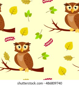 Seamless pattern with owls on tree branch and autumn leaves on yellow background