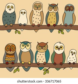 Seamless pattern with owls sitting on the branches.