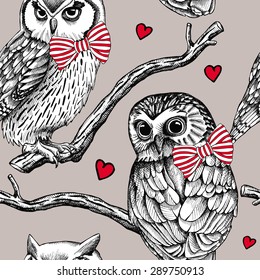 Seamless pattern. Owls with tie on branches and red heart on gray background. Vector illustration.