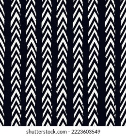 Seamless pattern. Paint brush chevrons ornament. Hand drawn geometrical backdrop. Triangular brackets wallpaper. Geometric background. Ethnic motif. Arrows textile print. Vector abstract.