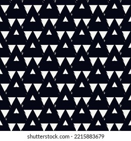 Seamless pattern. Paint brush triangles ornament. Hand drawn geometrical backdrop. Triangular shapes wallpaper. Geometric figures background. Ethnic motif. Textile print. Web design. Vector abstract.