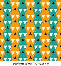 Seamless pattern. Paint brush triangles ornament. Hand drawn geometrical backdrop. Triangular shapes wallpaper. Geometric figures background. Ethnic motif. Textile print. Web design. Vector abstract.
