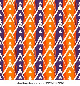 Seamless pattern. Paint brush triangles ornament. Hand drawn geometrical backdrop. Triangular shapes wallpaper. Geometric background. Ethnic motif. Arrows textile print. Web design. Vector scales.