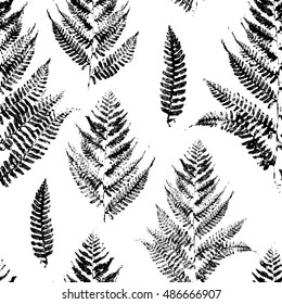 Seamless pattern with paint prints of fern leaves