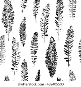Seamless pattern with paint prints of leaves