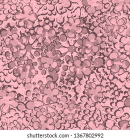 Seamless pattern. Painted mottled blots scattered over a multicolored background.