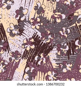 Seamless pattern. Painted mottled blots scattered over a multicolored background.
