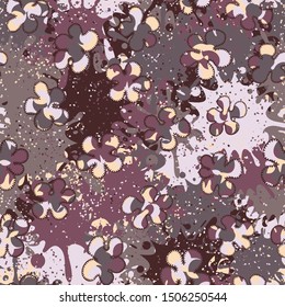 Seamless pattern. Painted mottled blots scattered over a multicolored background.