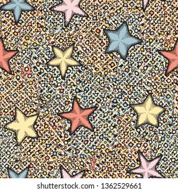 Seamless pattern. Painted starfish scattered over a multi-color background.