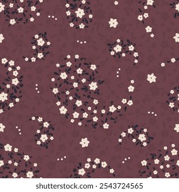 Seamless pattern with Paisley motifs filled with ditsy flowers. Traditional indian floral repeat design. Mughal boho background