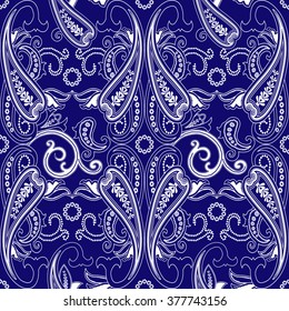 Seamless pattern with paisley ornament. Blue and white background in Eastern style. Ornate floral decor for wallpaper. Vector illustration