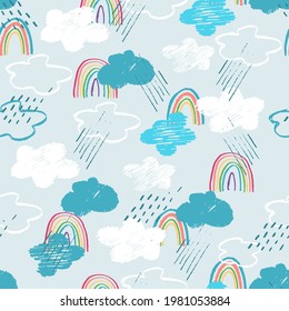 Seamless pattern with pale blue sky, rainy clouds, rainbows. Childs drawing style. Wallpaper, backgound for kids. Perfect for baby, toddler clothing, bed linen