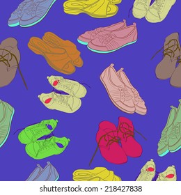 Seamless pattern of  pale colored shoes, boots, slippers on a blue pale background. Handmade.
