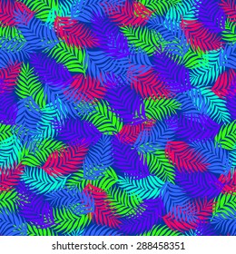 Seamless pattern of palm leaves branches superimposed on each other beautifully in dark blue and dark purple and bright pink and bright green fluorescent color