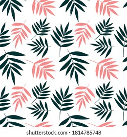 Seamless pattern with palm leaves on a white background. Tropical background.