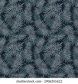 SEAMLESS PATTERN WITH PALM LEAVES ON A DARK GREEN BACKGROUND IN VECTOR