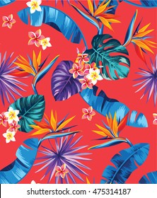 Seamless pattern with palm leaves and tropical flowers. Vector illustration.